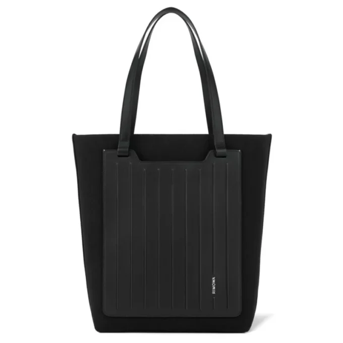 Never Still Vertical in Leder & Canvas TrageBags