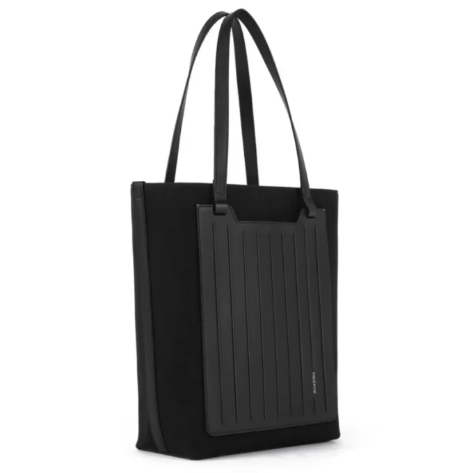 Never Still Vertical in Leder & Canvas TrageBags