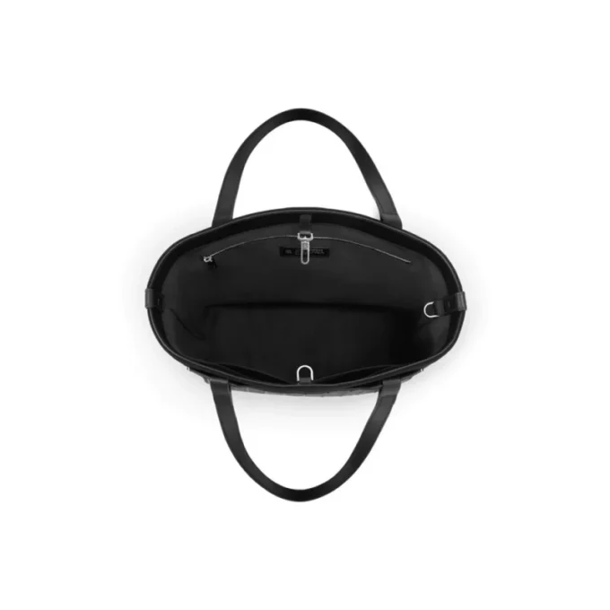 Never Still Vertical in Leder & Canvas TrageBags