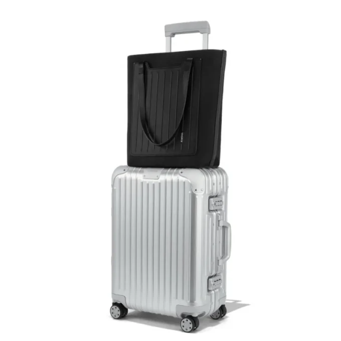 Never Still Vertical in Leder & Canvas TrageBags
