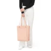 Never Still Vertical in Leder & Canvas TrageBags