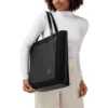 Never Still Vertical in Leder & Canvas TrageBags