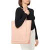 Never Still Vertical in Leder & Canvas TrageBags