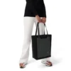 Never Still Vertical in Leder & Canvas TrageBags